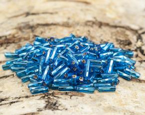 Bugle Beads Silverlined Twist 2x7 mm, Turkos (20g)