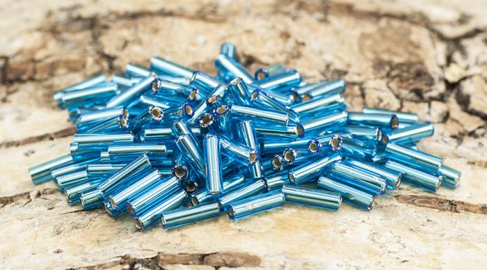 Bugle Beads silverlined 2x7 mm, Turkos (20g)