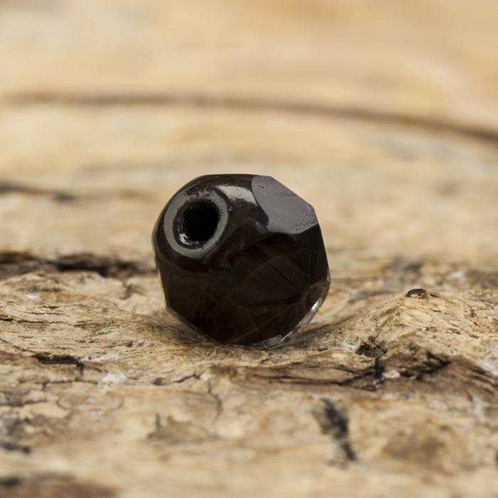 Glaspärla facetterad kula 6 mm, Klar/Svart (20st)