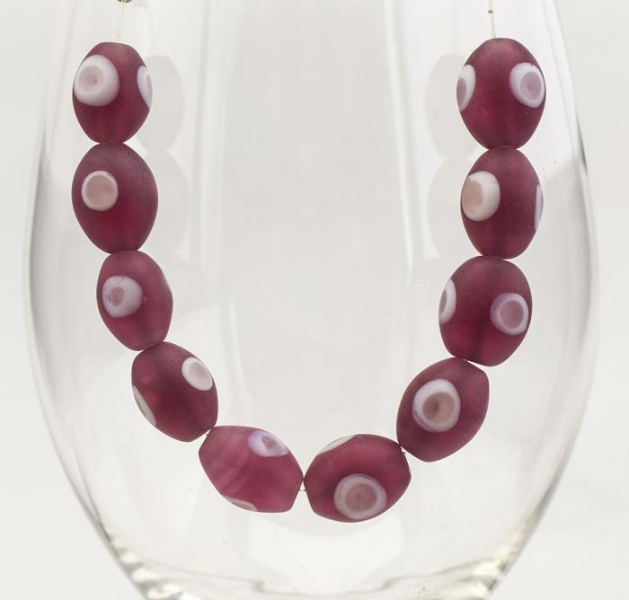 Oval glaspärla prick 11x14 mm, Cerise (5st)