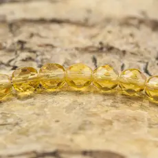 Glaspärla facetterad 4,5x5 mm, Honungsgul (25st)