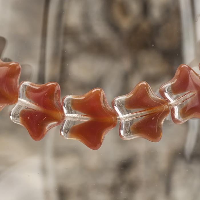 Glaspärla Stjärna 12x11 mm, Rödbrun/Klar (10st)
