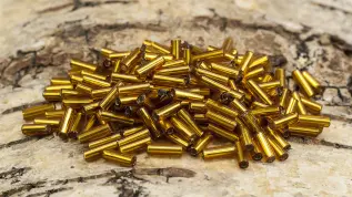Bugle Beads silverlined 2x7 mm, Bärnsten (20g)