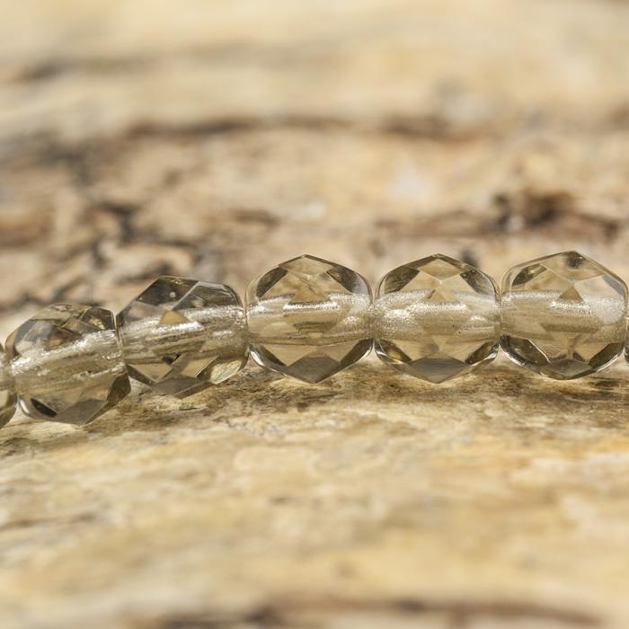 Glaspärla facetterad 4,5x5 mm, Grå (25st)