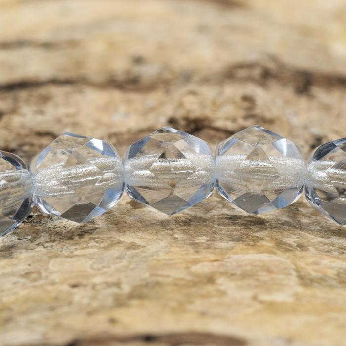 Glaspärla facetterad kula 7 mm, Isblå (15st)