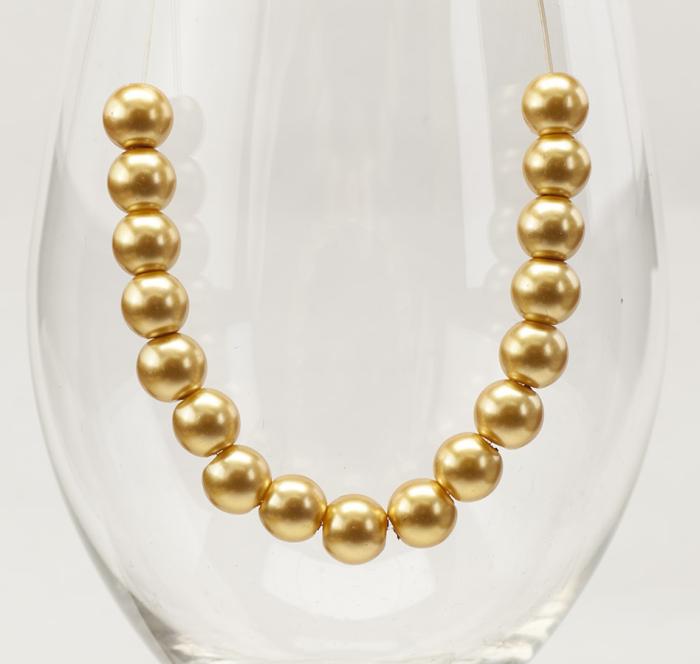 Vaxad glaspärla 8 mm, Guld (20st)