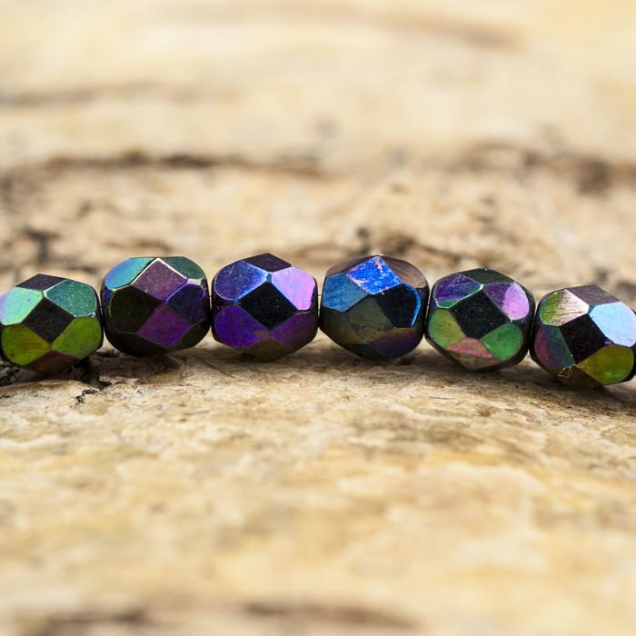 Glaspärla facetterad 4,5x5 mm, Blåsvart AB (25st)