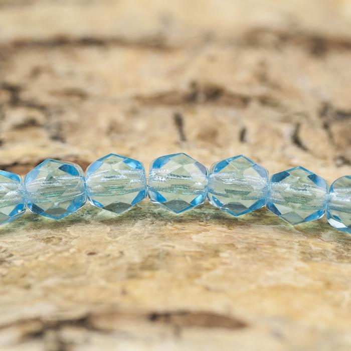 Glaspärla facetterad 4,5x5 mm, Himmelsblå (25st)