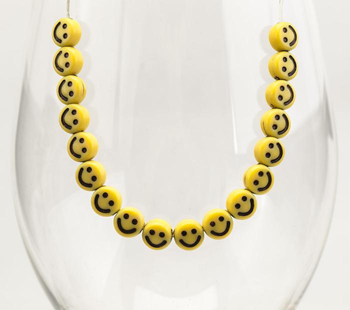 Akrylpärla Smiley 7 mm, Gul/Svart (25st)
