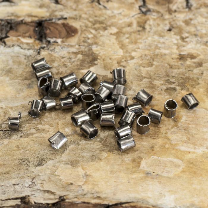 Klämpärla avlång 1,5 mm, Svart (100st)