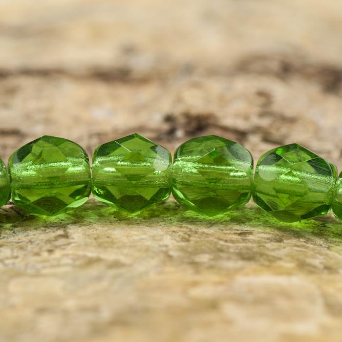 Glaspärla facetterad 4,5x5 mm, Grön (25st)