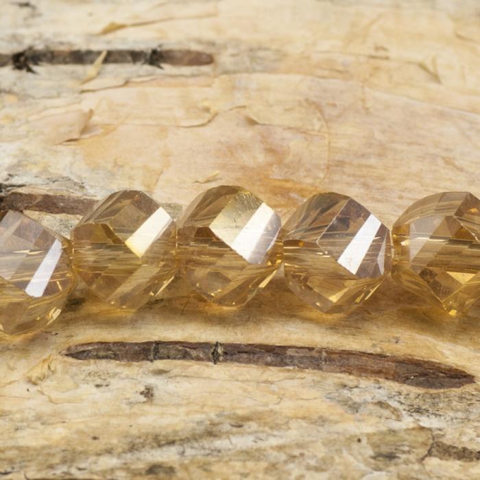 Glaspärla facetterad twist 6 mm, Beige AB (20st)
