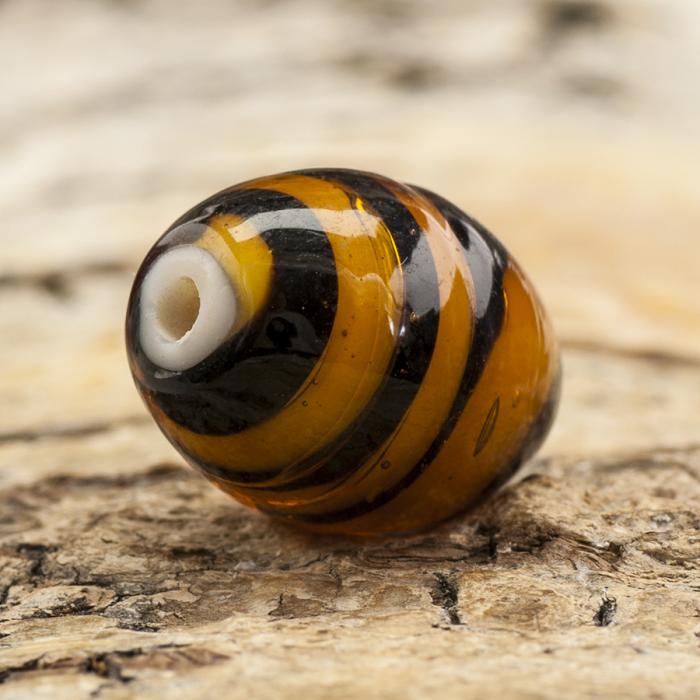 Oval glaspärla 12x15 mm, Bärnsten/Svart (5st)