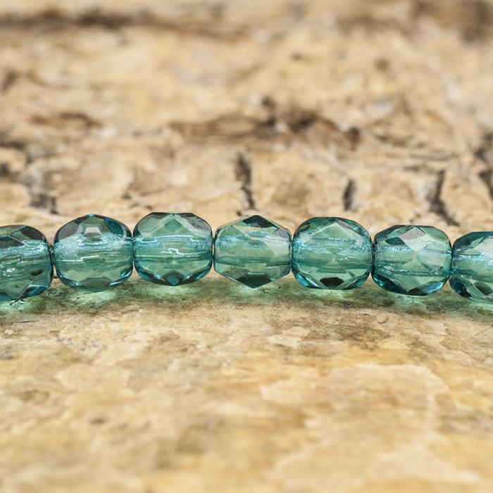 Glaspärla facetterad 3,5x4 mm, Turkosgrön (30st)